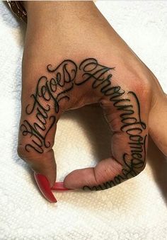 a woman's hand with the word happy birthday written in cursive writing on it