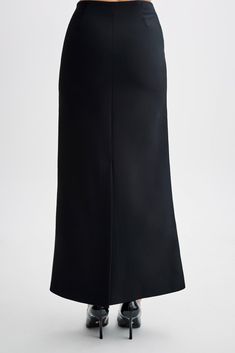 Maximum suiting.The MICAH Suiting Maxi Skirt epitomises timeless sophistication with a modern twist. Designed with a high waist and straight shape, it exudes effortless elegance. Its maxi length ensures a graceful silhouette for any occasion. Enhanced with contrast mock pocket detailing, side zipper, and centre back vent, this skirt offers both style and functionality. Whether paired with a blouse for a polished office look or the matching Micah Contrast Suiting Strapless Top, for a chic evening Classic Black Maxi Skirt For Work, Chic Straight Silhouette Evening Bottoms, Elegant Straight Silhouette Bottoms For Evening, Elegant Formal Maxi Skirt, Elegant Evening Bottoms With Straight Silhouette, Elegant Straight Silhouette Evening Bottoms, High-waist Fitted Maxi Skirt For Formal Occasions, Formal High-waist Fitted Maxi Skirt, Formal High Waist Fitted Maxi Skirt