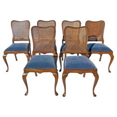 set of six french louis ii style cane back dining chairs with blue velvet upholstered seats