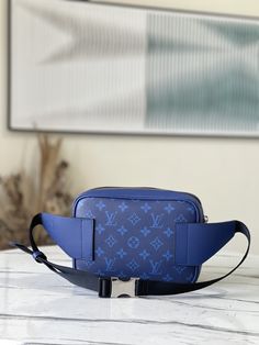 Blue Limited Edition Outdoor Waist Bag combines Monogram canvas and soft Taïga leather, using harmonious tones to outline modern lines. The internal structure is well-organized, and you can safely store your belongings while freeing your hands. Dimensions: 21.0 x 17.0 x 5.0 cm Modern Monogram Canvas Bag With Adjustable Strap, Modern Monogram Canvas Bags With Adjustable Strap, High-end Blue Shoulder Bag With Removable Pouch, Monogram Canvas Belt Bag With Detachable Strap, High-end Blue Shoulder Bag For Travel, Designer Travel Belt Bag With Detachable Strap, Designer Belt Bag With Detachable Strap For Travel, Blue Luxury Bag With Adjustable Strap, Luxury Coated Canvas Belt Bag For Everyday