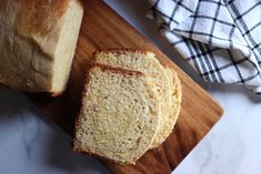 two slices of bread sitting on top of a cutting board