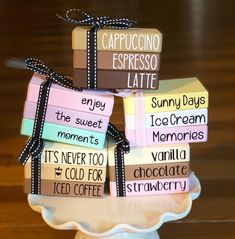 a stack of chocolates with words written on them