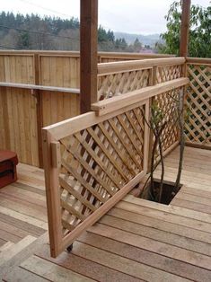 a wooden deck with a trellis design on it