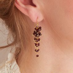 These are the perfect lightweight earring for anyone who loves a waterfall design red Garnet beaded drop earring. They remind me of Chinese pagodas, and are a nod to an exotic drop earring. Each deep red faceted bead has been wire-worked by hand in a step design with a hook and drop, and set in Sterling Silver and 18 carat Gold.  Red Garnet is the perfect Gemstone for any season, and can work beautifully dressed up or down. Great for a Summer wedding and a lunch date in Spring. Light enough to w Garnet Drop Earrings, Waterfall Earrings, Step Design, Spring Light, Waterfall Design, Garnet And Gold, Beaded Drop Earrings, Peridot Gemstone, January Birthstone