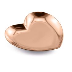 a rose gold heart shaped dish on a white background