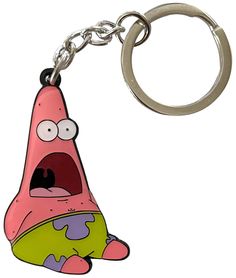 a cartoon character keychain with an angry expression on it's face and mouth