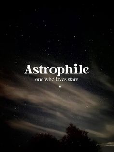 the words astrophile are lit up in the night sky