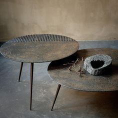 two round tables sitting on top of each other