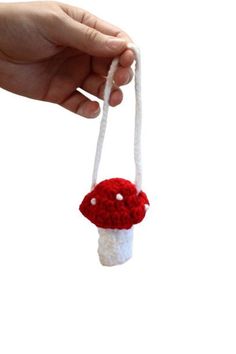 Crochet red spotted mushroom chap stick holder. Makes the perfect little gift! Made with 100% acrylic yarn. If you have any questions, please let me know. *Please be aware that some of our items may contain small parts that can be a potential choking hazard for young children. Please use responsibly! *Due to everyone's computers being different, colors may look different depending on the screen resolution or picture quality. If you would like to see more from us, please visit our shop: - www.ets Crochet Chapstick Holder Pattern Free Mushroom, Crochet Strawberry Chapstick Holder, Crochet Mushroom Lip Balm Holder, Mushroom Chapstick Holder Crochet, Mushroom Chapstick Holder, Crochet Mushroom Necklace Pouch, Spotted Mushroom, Sister Crafts, Chapstick Holder