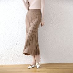 Midi, high-waist, A-line type, solid, pleated, cashmere knit skirt - available in 4 colors. MATERIALS · 100% Cashmere CARE Hand wash at max. 30ºC/86ºF Do not use bleach Iron at a maximum of 110ºC/230ºF Do not dry clean Do not tumble dry Casual Blouse Designs, Autumn Skirt, Striped Midi Skirt, Christmas Party Dress, Winter Skirt, Empire Dress, Fall Skirts, Boho Maxi Dress, Maxi Dress Party