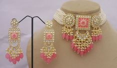 Occasion might be any, getting ready In a Sophisticated Manner Is Women'S Thing that they enjoy the most Indian Bridal Kundan Jewelry Set, Kundan Choker Necklace Earrings Set, Pink Beads Engagement Necklace Set, High Quality Necklace Jewelry Set ITEM DESCRIPTION Metal = Gold Plated Occasion = Wedding ,Party Wear, Bridal Color = Pink and White Size = Necklace Length = 20 CM, Necklace Weight = 72 Gram Earrings Size = 9 CM Earrings Weight = 118 gram each earrings 100% Satisfaction Guarantee: 1 Year Luxury Pink Kundan Necklace For Festive Season, Luxury Elegant Pink Kundan Necklace, Kundan Choker Necklace, Engagement Necklace, Kundan Jewellery Bridal, Kundan Jewellery Set, Engagement Necklaces, Kundan Choker, Wedding Party Wear