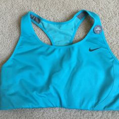 Never Worn. Ordered It And It Was Too Small On Me. Nike Blue Sports Bra With Moisture-wicking, Nike Blue Moisture-wicking Sports Bra, Blue Nike Sports Bra For Training, Nike Blue Sports Bra For Training, Nike Blue Sports Bra For Workout, Nike Sporty Blue Sports Bra, Casual Blue Sports Bra For Training, Casual Blue Racerback Sports Bra, Nike Sports Bra