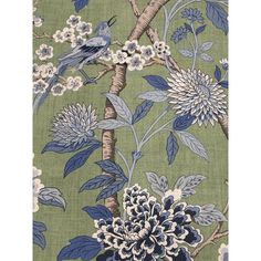 a blue and green floral wallpaper with birds on it's branches in the background