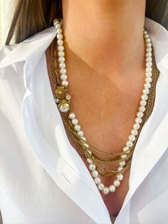 Vintage multi strand long necklace with one pearl strand and multiple gold chain strands featuring a rhinestone and pearl floral centerpiece. sourced by Erin Knight Designs Pearl Strand, Floral Centerpiece, Pearl Strands, Beautiful Lakes, Floral Centerpieces, Accessories Store, Multi Strand, Vintage Necklace, Long Necklace