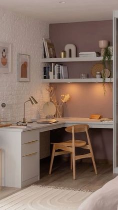 a room with a desk, chair and bookshelf next to a bed in it