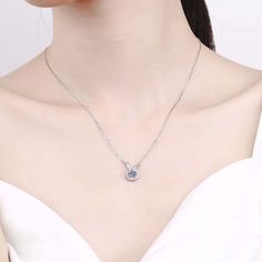 Feel the sparkle of the 925 Silver Moissanite on our Cute Bunny Necklace. The stone is cut to perfection and designed to reflect the light for a captivating glimmer. An exquisite piece of jewelry with a unique design. Product Details: Material: 925 Sterling Silver Stone: Moissanite Diamonds/D /1 carat Weight: about 2.13g Length: 45cm Pendant Diamond Height: 6.5mm SKU: AN23102328 Keywords: moissanite chain, moissanite necklace, moissanite pendant, moissanite pendants, moissanite diamond chain, pe Silver Necklace With Diamond Cut, Silver Necklace With Diamond Cut Round Shape, Silver Necklace With Diamond Cut Round Stone, Silver Solitaire Necklace Fine Jewelry, Fine Jewelry Moissanite Gemstone Necklaces, Diamond White Gemstone Round Necklace, Dazzling Silver Solitaire Necklace In Sterling Silver, Silver Moissanite Solitaire Pendant Necklace, Dazzling Silver Solitaire Pendant Necklace