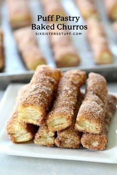 puff pastry baked churros on a plate with other pastries in the background