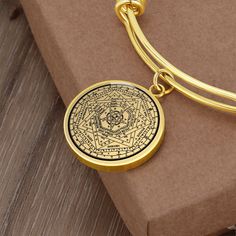 "This Seal of the True God Bracelet Is the Perfect Gift Whether for Yourself or a Loved One. Explore all our Witchcraft jewelry here: https://www.etsy.com/in-en/shop/SymbolicPresent?ref=seller-platform-mcnav&section_id=22613465 ➜ Our jewelry is made of high-quality surgical steel with a shatterproof liquid glass coating and an 18k gold finish option. ➜ Engrave onto the back of the Sigillum Dei Aemeth pendant your loved one's name, your wedding date, an anniversary, or anything else you want to r Symbolic Etched Jewelry For Blessing, Spiritual Pendant Bracelets For Gifts, Symbolic Brass Bracelets As Gift, Spiritual Brass Bracelet Gift, Spiritual Brass Bracelets As Gifts, Spiritual Brass Bracelets For Gifts, Etched Round Bracelet As Gift, Round Spiritual Collectible Bracelets, Spiritual Round Brass Bracelets