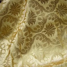 Beige Brocade Fabric Crafting Indian Brocade Fabric by the Yard Wedding Dress Banarasi Bridal Dress Material Sewing Leheng Blouses costumes. This is a beautiful heavy benarse blended silk brocade floral design fabric in Beige and Gold.  ➤Product: Brocade Fabric ➤Fabric Type: Blended Silk (Viscose and Silk) Fine quality Zari Brocade Weaving from Banarasi ➤Color: Beige and Gold ➤Width: 44 inches. ➤Condition: New ➤Code: bg1485 ➤Listing for 1 Yard of fabric. ➤Care: Dry Clean Only You can use this fabric to make Dresses, Tops, Blouses, Jackets, Crafting, Clutches or Evening Bags, Embellish your clothes, Pillows, Drapery, Home Décor, Outdoor, Quilting, Sewing, General, Upholstery etc use it for scrap booking projects. If you purchase more than 1 Yard you will get it in running length, not in pie Brocade Blouse Piece For Eid Wedding, Eid Wedding Brocade Blouse Piece, Wedding Brocade Dupatta With Pallu, Wedding Dupatta With Pallu In Brocade, Brocade Saree For Wedding And Eid, Gold Brocade Lehenga With Traditional Patterns, Elegant Wedding Fabric With Motifs, Wedding Brocade Blouse Piece With Dupatta, Wedding Blouse Piece With Brocade Dupatta