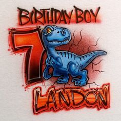 a t - shirt that says birthday boy with a dinosaur on it and the number seven