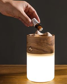 Inspired by the simplicity of travel and nature, the Nomad Lantern Lamp offers a portable yet stylish lighting solution. Its warm wooden top and handle evoke a sense of rustic charm, while the frosted base provides a soft, ambient glow perfect for any space. If you have any questions about our products, please get in touch with us and we will reply to you within 24 hours. Product Size With hand strap Model A Size: Dia 10cm x H 16cm / ∅ 3.9″ x H 6.3″ Without hand strap Model B Size: Dia 10cm x H 16cm / ∅ 3.9″ x H 6.3″ Details Material: Metal, Wood, Acrylic. Light source: Integrated LED. Kelvin range: Warm Light (3000K), Neutral Light (4000K), Cool Light (6000K). Power: ~3W Voltage: AC 110-240V. Moisture resistance: IP 20 Damp-rated not waterproof, for indoor use only. Environment: Indoor. B Crystal Chandelier Kitchen, Lantern Table Lamp, Hallway Wall Lights, Portable Lighting, Tiffany Style Table Lamps, Chandelier Art, Kitchen Island Chandelier, Recessed Wall Lights, Flushmount Ceiling Lights