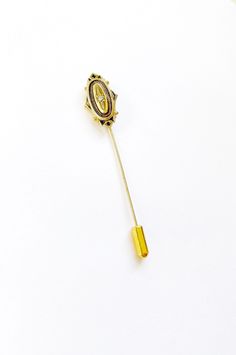 "Beautiful vintage stick pin from the \"Kensington\" collection by Avon. In lovely vintage condition perfectly straight pin. Adorned with a crystal clear rhinestone, perfect for that April Birthday gift!  2 5/8\" tall 1/2\" wide Signed AVON  Ready to ship! Fast Shipping!! Packaged with care in a protective cotton filled gift box!🎁 ♻️All items in this shop are one of a kind, hurry because that means we only have one!! For more Vintage Treasures at awesome prices~ Please check out our other listi Elegant Gold Enamel Pin Collectible, Elegant Gold Enamel Pin For Collectors, Antique Gold Pins For Formal Occasions, Antique Gold Enamel Pin Gift, Antique Gold Enamel Pin For Formal Occasions, Formal Gold Enamel Pin, Antique Gold Lapel Pin Collectible, April Birthday, Brass Bangle