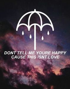 an umbrella with the words don't tell me you're happy cause this isn't love