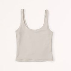 Abercrombie Women's Sleek Seamless Scoopneck Cami Size- Large Color- Taupe Solid Top With Built-in Bra And Scoop Back, Spring Scoop Neck Top With Seamless Construction, Spring Tops With Seamless Construction And Scoop Neck, Everyday Solid Scoop Neck Crop Top, Everyday Solid Color Scoop Neck Crop Top, Casual Scoop Neck Seamless Camisole, Chic Seamless Second-skin Top, Chic Scoop Neck Seamless Tank Top, Solid Tank Top With Seamless Construction And Scoop Back