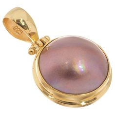 925 Silver Very Large 18mm Mauve Mabe Pearl Vermeil Gold Plated Pendant, 1 3/8"   925 Silver Very Large 18mm Mauve Mabe Pearl Vermeil Gold Plated Pendant, 1 3/8" Detail Bail Diameter: 5mm Silver Type: 925 sterling silver Pendant Size: 30x20mm(1 3/8x13/16") incl.bail Pendant Weight: ~5grams Pearl Type: Lavender mauve South Sea cultured mabe pearl(18mm) Item Code: 29581-83536 Shipping Domestic US shipping is entirely FREE. International buyers, please refer to the shipping tab, typically it is $12 Wearing Pearls, Mabe Pearl, Shell Jewelry, Pearl Types, Fine Jewellery Necklace, Pearl Pendant, Sterling Silver Pendant, Sterling Silver Pendants, Silver Pendant