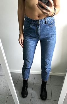 It's a Vintage 90s blue classic girlfriend cropped casual jeans. Zip fly. The high waisted. Taper leg. Not stretchy. Condition: Great vintage condition. Material: 100% cotton. Size: S. Model's height: 5.7 / 178 cm / Size S. MEASUREMENTS: Waist doubled: 26 inch / 68 cm. Hips doubled: 35 inch / 90 cm. Front rise: 10,5 inch / 27 cm. Inseam: 26 inch / 67 cm. Length: 36 inch / 92 cm. Worldwide shipping. Shipping takes to: USA 7-14 days.  EU 4-7 days. Others countries 7-14 days. Classic High Waist Cropped Denim Jeans, Cropped Denim Blue Pants, Denim Blue High Waist Mom Fit Cropped Jeans, High Rise Mom Fit Denim Blue Bottoms, High Waist Mom Fit Cropped Jeans In Denim Blue, Medium Wash Cropped Leg Mom Fit Bottoms, Medium Wash Cropped Mom Jeans, Medium Wash Mom Fit Cropped Bottoms, Medium Wash Mom Fit Cropped Jeans