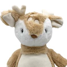 a stuffed animal that is brown and white