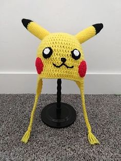 a crocheted hat that looks like a pikachu