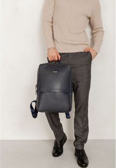 Our men's backpack combines classic and modern design. The accessory is made of smooth natural black leather.The appearance of the backpack does not oblige you to adhere to a certain style of clothing. That allows you to use this accessory for various purposes: business meetings, trips, walks with friends. The backpack has a concise design, keeps its shape well and is quite resistant to deformation.The large main compartment closes with a zipper. The lining material is made of durable fabric.Ins Walks With Friends, Leather Backpack For Men, Classic Office, Unisex Backpack, Belt Purse, Unique Bags, Men's Backpack, Backpack Purse, Laptop Backpack