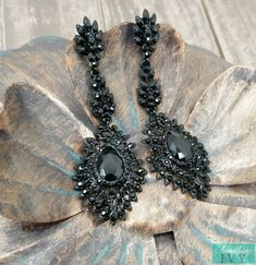 "❤Shop with us online at - https://SomethingIvy.com/❤ Fast Ship - 3\" - Black Drop Earrings - Black Chandelier Earrings - Black Rhinestone Earrings See our other earrings with the same beading here - https://www.etsy.com/listing/581202824/fast-ship-3-black-drop-earrings-black Sign up for promotions here - https://somethingivy.com/pages/promo-sign-up Pierced Earrings Black Onyx & black tones trim. Stunning dangle and drop earrings for your black dress or black accented dress. Size - 3\" long" Black Crystal Chandelier Earrings For Party, Black Teardrop Rhinestone Jewelry, Black Teardrop Jewelry With Rhinestones, Black Drop Crystal Earrings, Black Dangle Rhinestone Jewelry, Black Rhinestone Dangle Jewelry, Black Dangle Jewelry With Rhinestones, Glamorous Black Crystal Earrings For Wedding, Black Crystal Chandelier Earrings