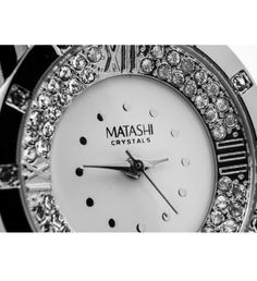 With its timeless look and dazzling array of radiant Matashi crystals, this beautiful classic watch with white face will add a touch of elegance to any outfit. The 18k white gold plating gives this chain link watch a luxe look; Crafted with quality materials like 18K White Gold and embellished with high quality Crystals means that this watch is a winner wherever you decide to wear it! | This carefully crafted watch is plated with 18K white gold which enhances its eye catching design. Integral to Elegant Diamond White Watch With Bling, Elegant Cubic Zirconia Party Watches, Elegant Crystal Diamond Watch With Diamond Hour Markers, Elegant Diamond Watch With Crystal, Round Crystal Watch As Gift, Crystal Watch As A Gift, Elegant Crystal Watches As Gifts, Elegant Crystal Watches For Gifts, Elegant Round Crystal Diamond Watch