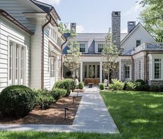 a large white house with lots of windows