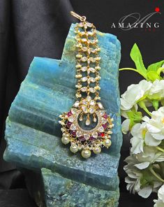 Polki Mangtika | Moissanite Polki Mangtika| Indian Traditional Mangtika | Indian Polki Mangtika | Moissanite Mangtika Material : Silver Gemstone: Moissanite, Ruby Hydro Chip Stones & Pearls Stone colour: Uncut polki Primary colour: Gold Closure : Hook Lock Mangtika length: 105mm Mangtika width : 40mm Silver Intricate, hand crafted, Pure Silver Polki Mangtika, studded with high quality Moissanite Polki , made in 92.5 silver with 22ct gold plating. Product comes with 92.5 silver hallmark. - We Fusion Style Bridal Necklace With Round Tilla, Fusion Style Chandbali Bridal Necklace For Ceremonies, Fusion Style Chandbali Bridal Necklace For Ceremonial, Fusion Style Bridal Kundan Necklace, Kundan Hand-set Tikka For Puja, Fusion Style Bridal Necklace With Latkans For Festivals, Festive Hand Set Tikka For Ceremonial Occasions, Fusion Kundan Necklace With Tilla For Puja, Fusion Style Kundan Chandbali Necklace For Puja