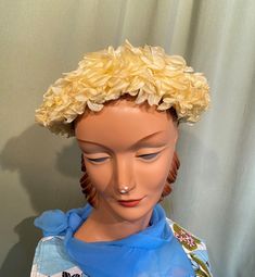 "This is a lovely, vintage hat from the 50s or early 60s. No labels or tags. No size tags. It measures 21\" around the inside. It is made of a stiff, sunny yellow form. The edge has a wide border of yellow fabric flowers, all around. The very edge of the hat is yellow velvet. The hat is in good, vintage condition. No damage or other issues. Small pin dot spot on top. No other soil or wear. So chic!" Vintage Cream Fascinator For Royal Ascot, Cream Vintage Fascinator For Royal Ascot, Vintage Cream Wide Brim Fascinator, Vintage Wide Brim Cream Fascinator, Vintage Summer Fascinator For Garden Party, Cream Wide Brim Vintage Fascinator, Vintage Cream Fascinator With Short Brim, Vintage Brimmed Mini Hats, Vintage Cream Fascinator For Summer