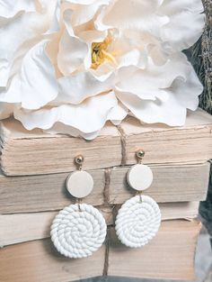 Discover the unique charm of our Beautiful Cream Clay Earrings. Handcrafted with precision, these earrings embody the rich, earthy tones of white clay, adding a touch of natural beauty to your style. Elevate your look with these distinctive accessories. Beige Clay Earrings, Handmade Cream Round Earrings, Handmade White Polymer Clay Jewelry, White Nature-inspired Drop Earrings, Nature-inspired White Drop Earrings, Handmade Minimalist Beige Jewelry, Beige Dangle Jewelry For Everyday, Minimalist Handmade Beige Jewelry, Nickel-free Cream Dangle Jewelry