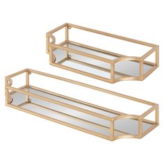 two gold metal trays with mirrors on them