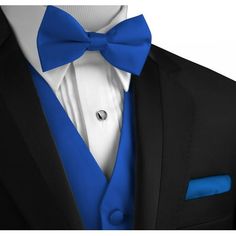 a man in a tuxedo with a blue bow tie