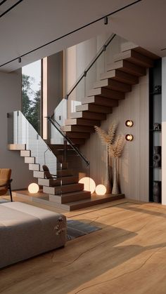 a living room filled with furniture and a stair case