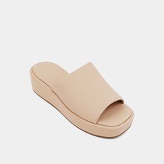 Introducing LOURDES, the ultimate tribute to the late 1990s chunky sandals. With a super comfortable wedge heel and a luxurious faux leather finish, these versatile sandals are the perfect complement to any outfit, from cropped denim to midi dresses. Comfortable Wedges, Chunky Sandals, Loafer Mules, Cropped Denim, Mule Clogs, Sneaker Heels, Boot Sandals, Wedge Heels, Mommy And Me