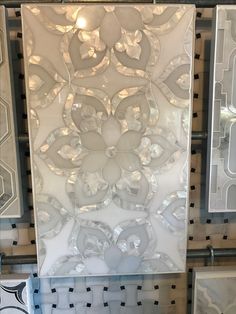 decorative glass panels on display in a store