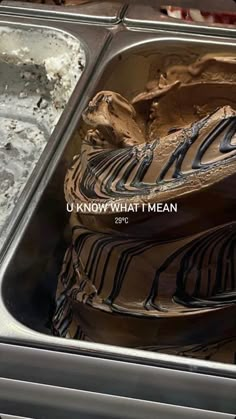 a chocolate cake in a metal container with the words u know what i mean