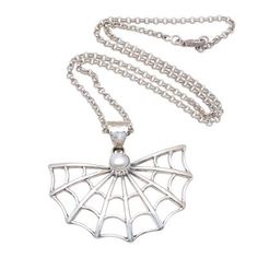 Framed by a spider web that is crafted from sterling silver a petite glowing cultured pearl is featured in the pendant of this necklace. Rosalia Tarigan designs this necklace perfect for Halloween. Elegant Sterling Silver Necklace For Halloween, Elegant Sterling Silver Halloween Necklace, Elegant Halloween Pendant Necklace, Jewellery Exhibition, Over The Shoulder Bags, Sterling Silver Dangle Earrings, Pearl Pendant Necklace, Rolo Chain, Women Artisans