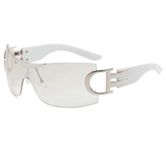 Elevate your style game with our Oversized Rimless Double D Armed Y2K Wholesale Sunglasses. These statement-making shades will make you stand out from the crowd, while providing maximum UV protection for your eyes. Guaranteed to bring compliments and protect your vision - the perfect combination! Plastic Sunglasses With Gradient Lenses For Streetwear, Rimless Shield Sunglasses With Mirrored Lenses, Rimless Glass Shield Sunglasses With Tinted Lenses, White Polycarbonate Shield Sunglasses With Uv Protection, Rimless Clear Shield Sunglasses With Uva Protection, Clear Rimless Shield Sunglasses With Uva Protection, Rimless Plastic Shield Sunglasses With Gradient Lenses, Rimless Shield Sunglasses With Tinted Lenses, Rimless Plastic Shield Sunglasses With Tinted Lenses