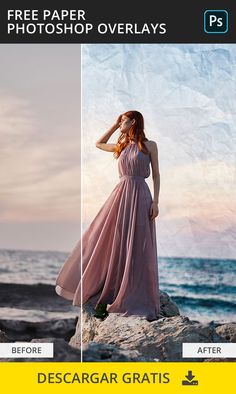 a woman in a pink dress standing on rocks near the ocean