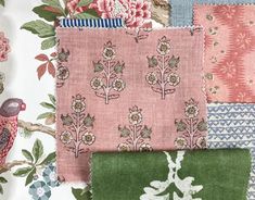 several different colored fabrics with flowers and birds on them, all in various colors from pink to green