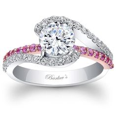 an engagement ring with pink and white diamonds